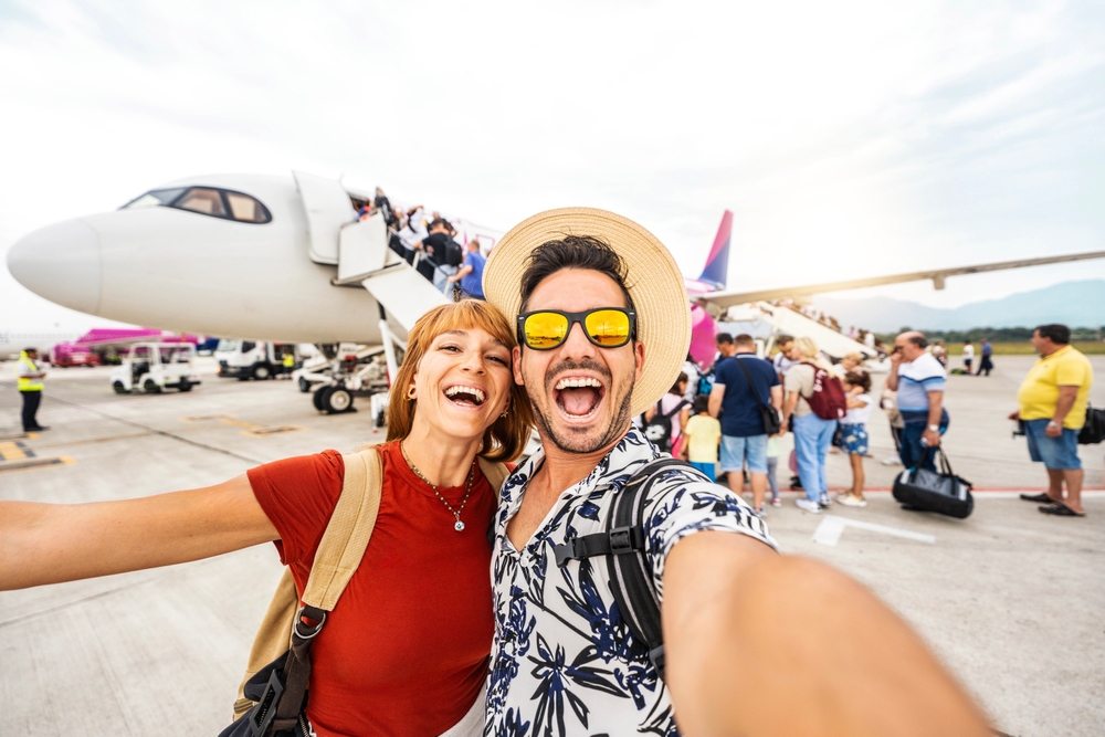 Happy tourists at the airport